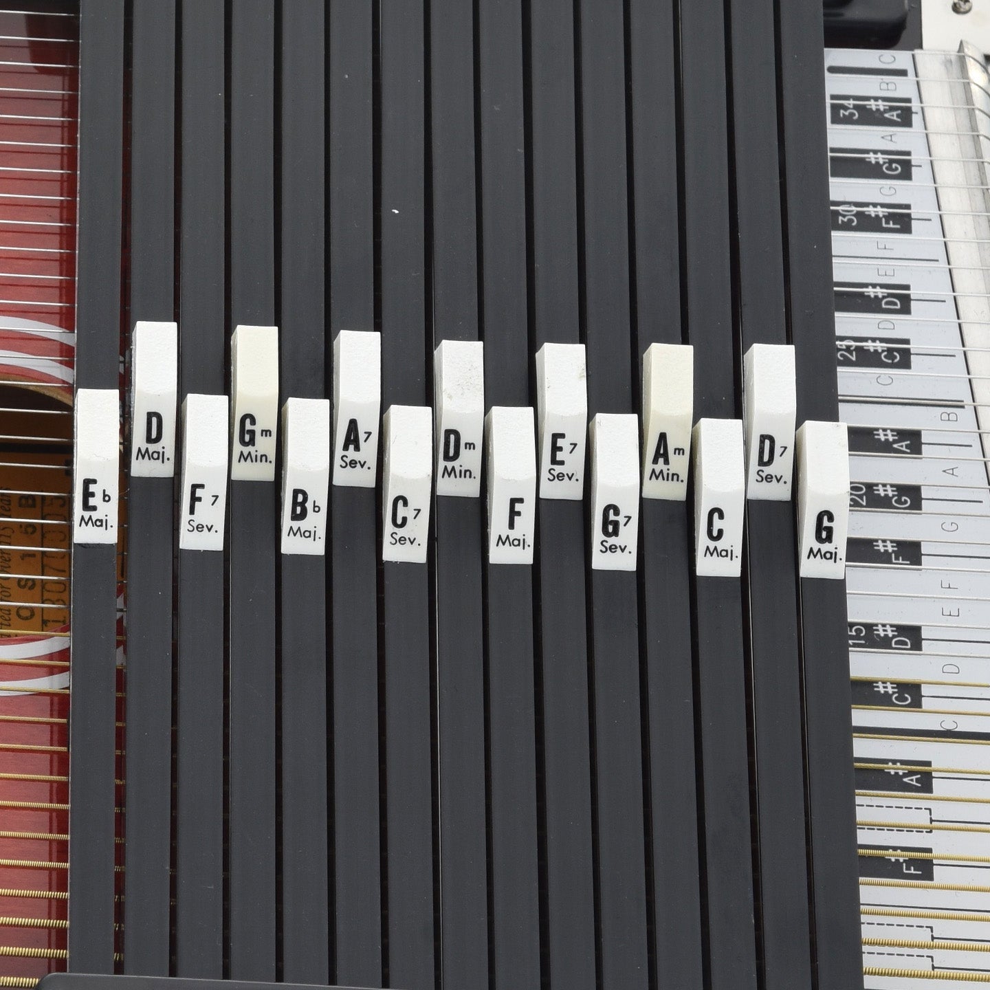 View of new 15-bar autoharp with buttons installed