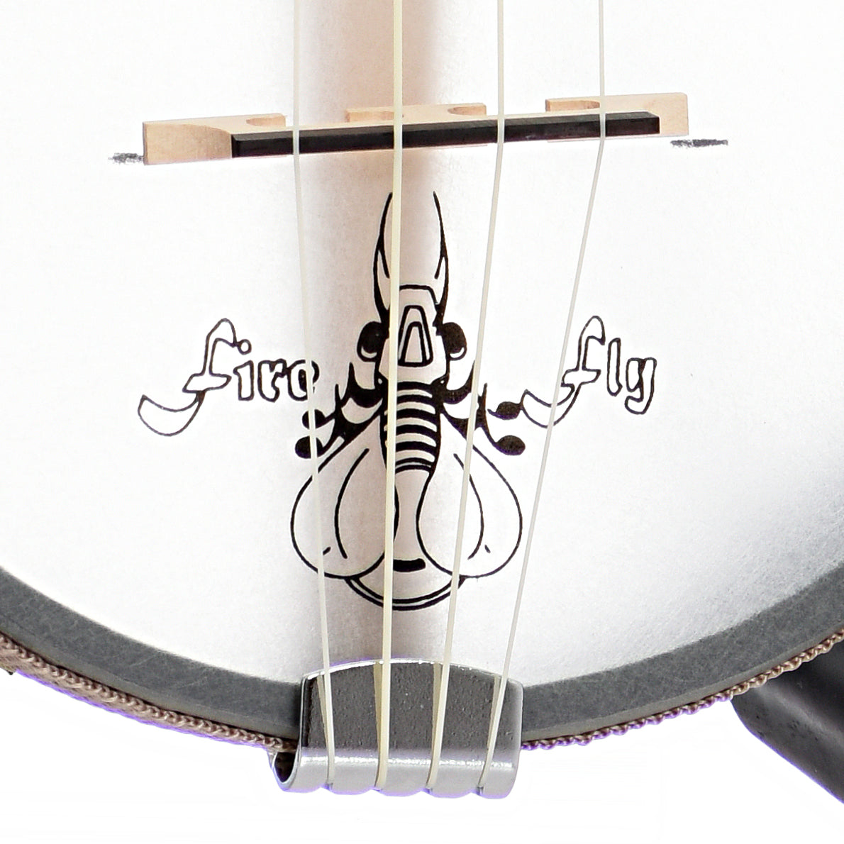 Tailpiece and bridge of Magic Fluke Company Firefly Soprano Banjo Uke