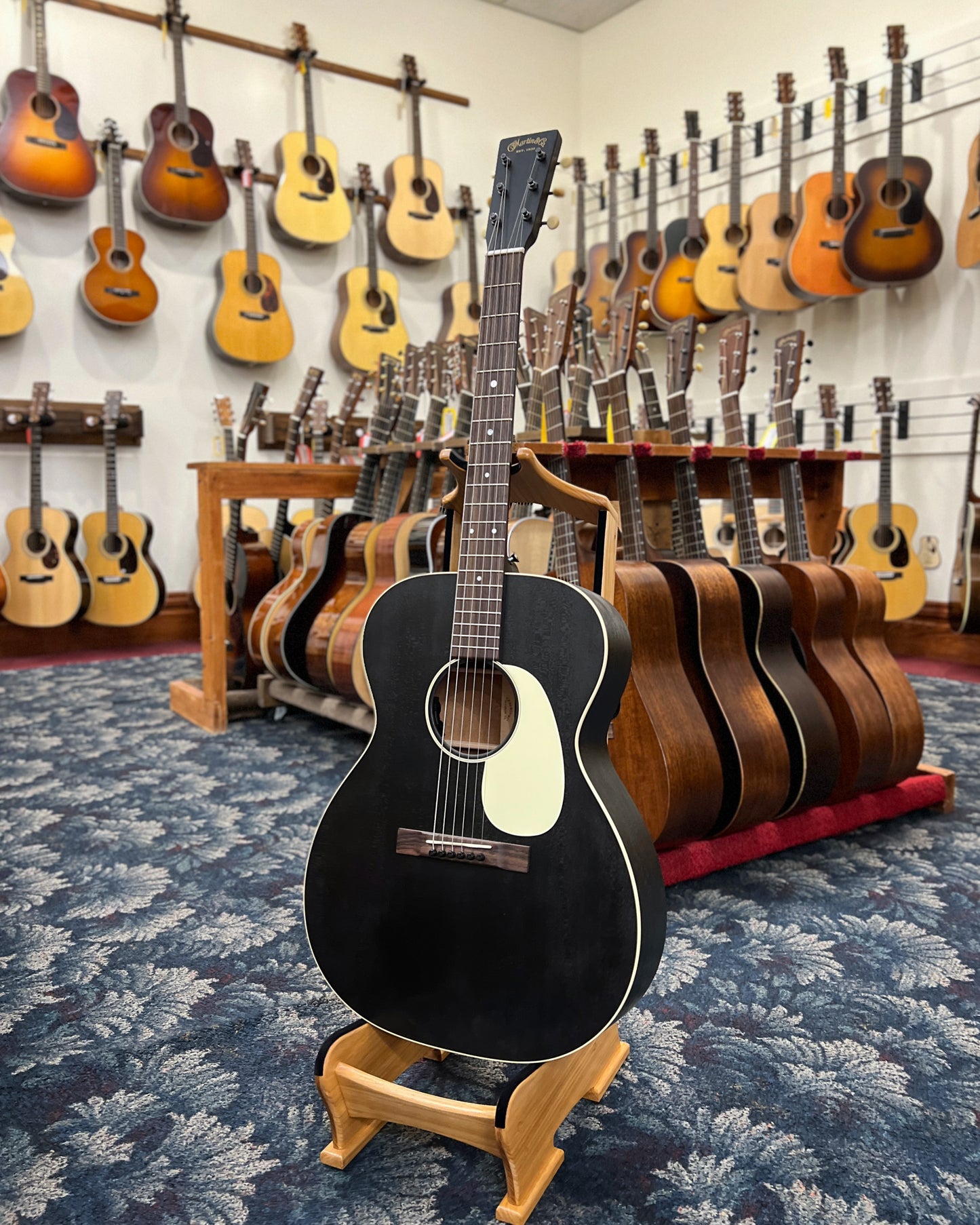 Showroom photo of Martin 000-17E Black Smoke Guitar with Pickup & Gigbag