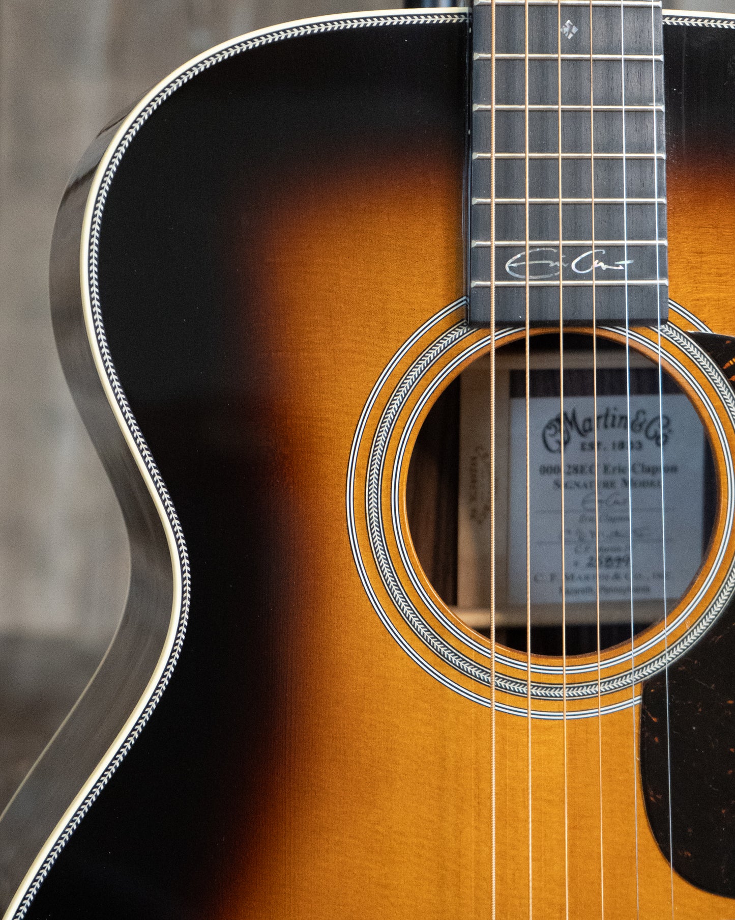 Showroom photo of Martin 000-28EC Sunburst Eric Clapton Model & Case