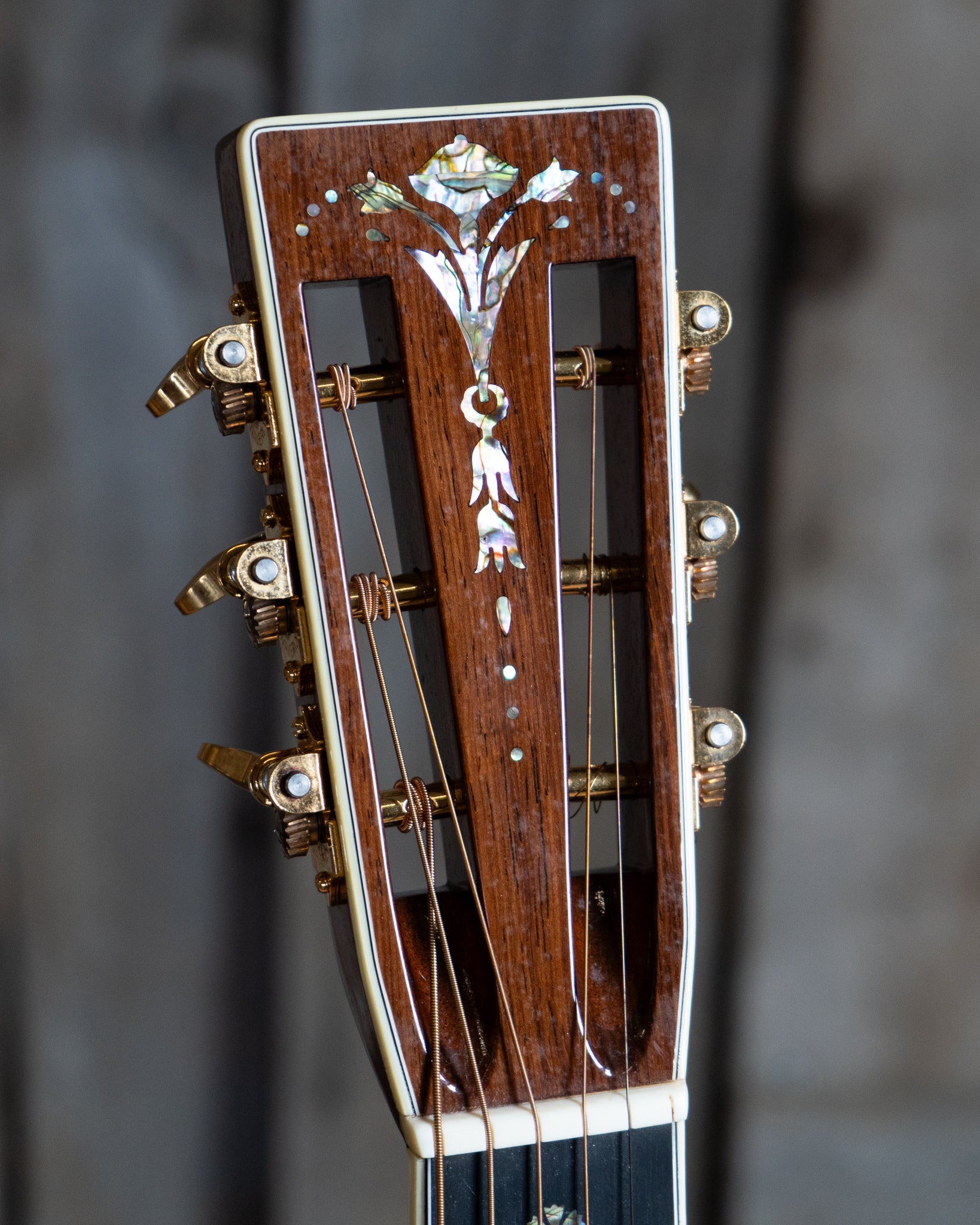 Showroom photo of headstock of Martin 000-42 Custom Shop 12-Fret Madagascar Acoustic Guitar (2013)