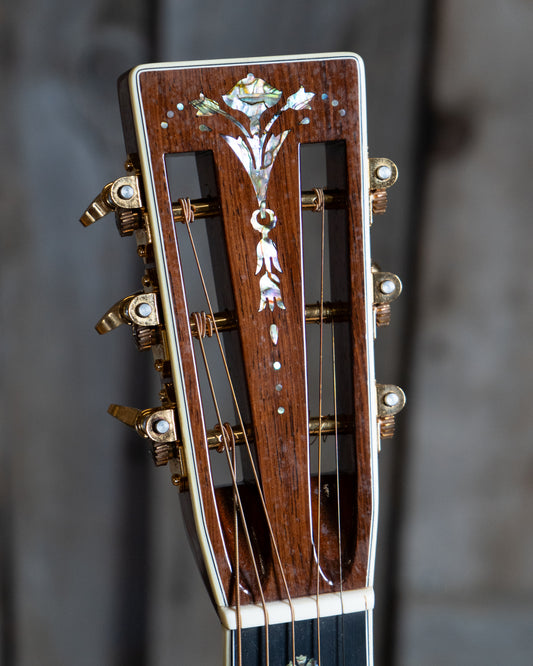 Showroom photo of headstock of Martin 000-42 Custom Shop 12-Fret Madagascar Acoustic Guitar (2013)