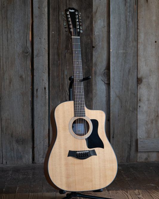 Showroom photo of Taylor 150ce 12-String Acoustic-Electric Guitar & Gigbag