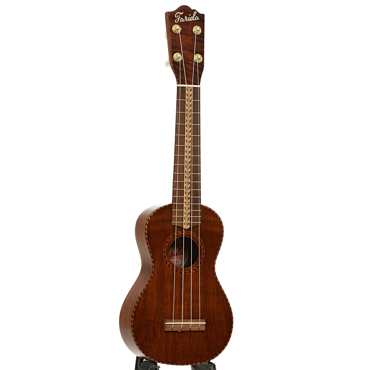Full front and side of Farida Holiday Pack, Koa Soprano Ukulele