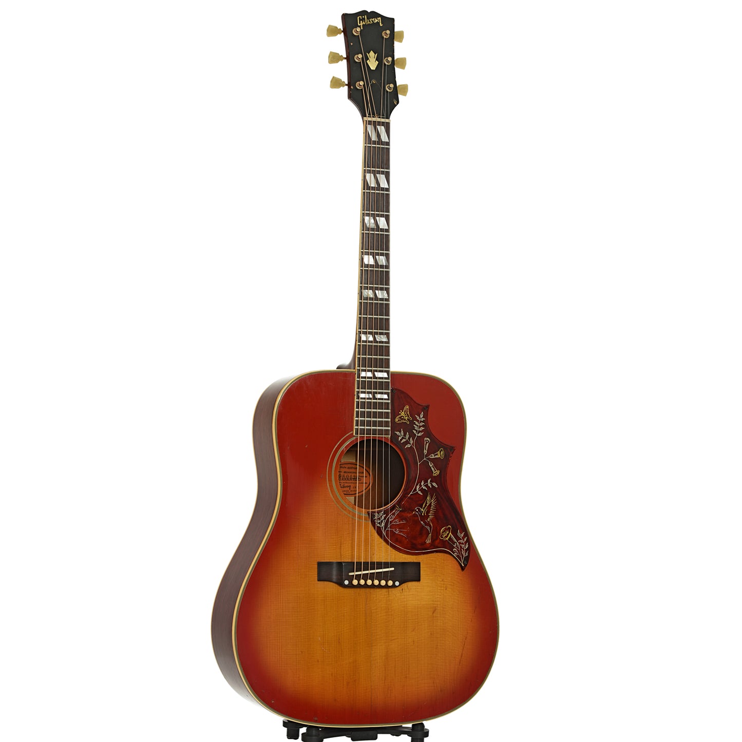 Full front and side of Gibson Hummingbird Acoustic Guitar