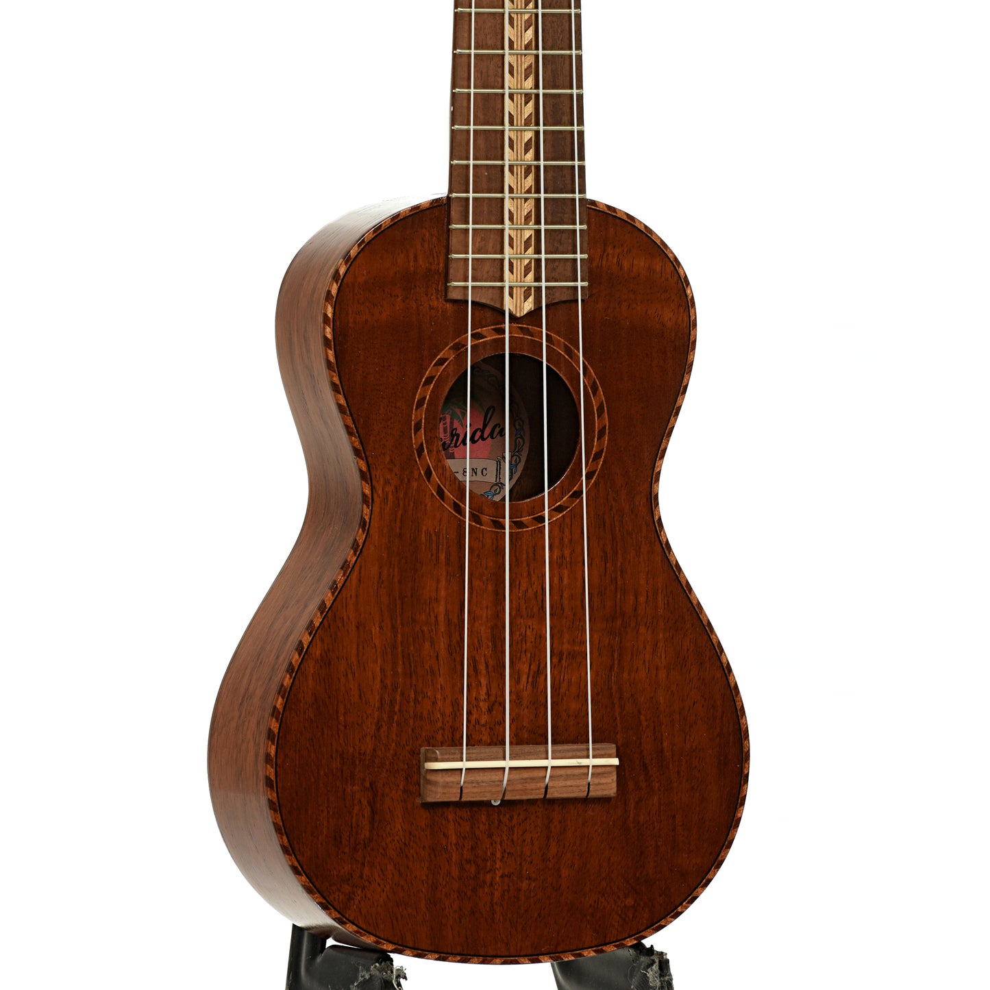 Front and side of Farida Holiday Pack, Koa Soprano Ukulele