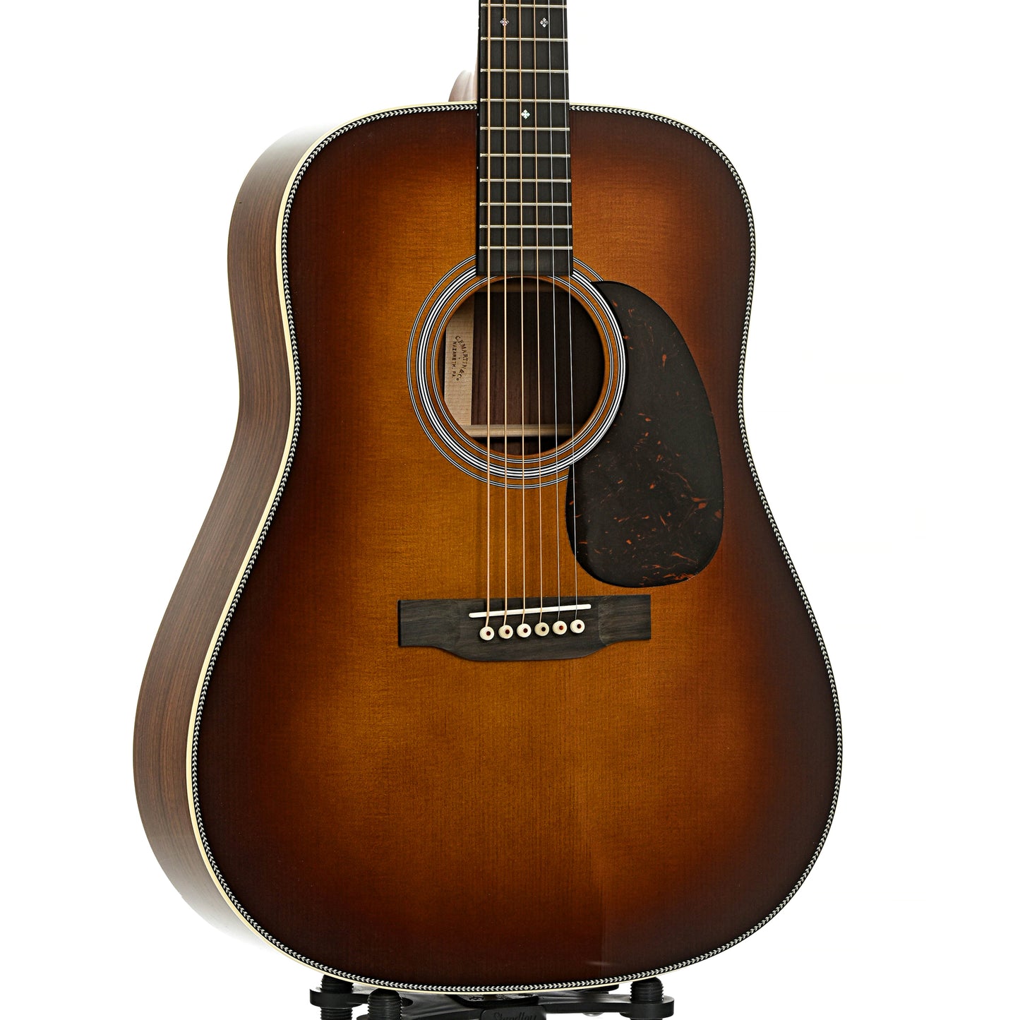 Front and side of Martin HD-28 Ambertone Guitar & Case