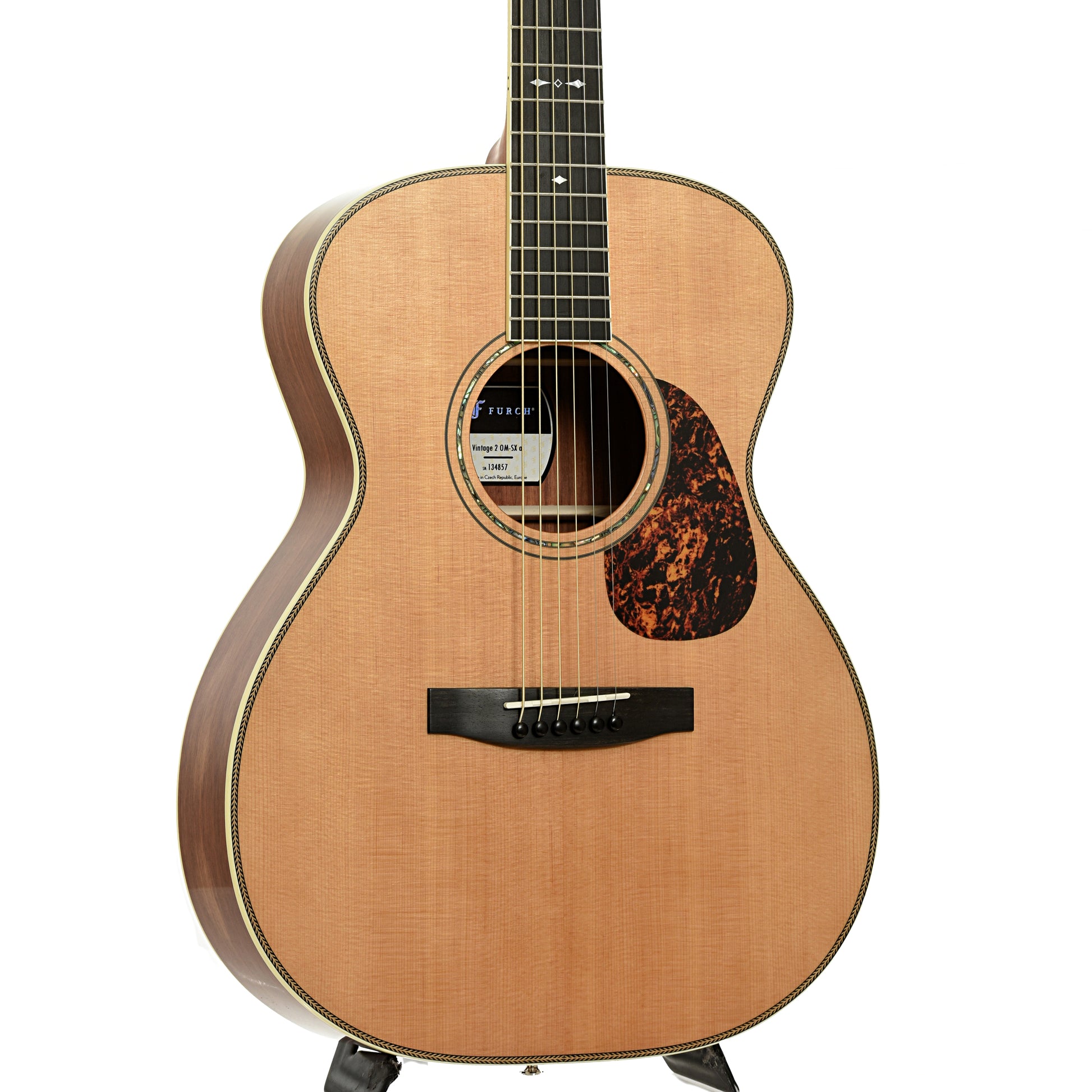 Front and side of Furch Limited Edition Vintage 2OM-SX a Acoustic Guitar