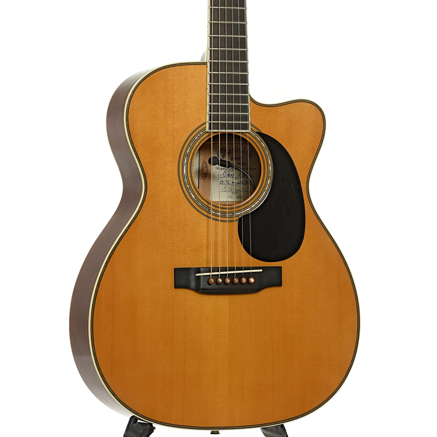 Front and side of Martin 000C Steve Miller Pegasus Signature Acoustic Guitar