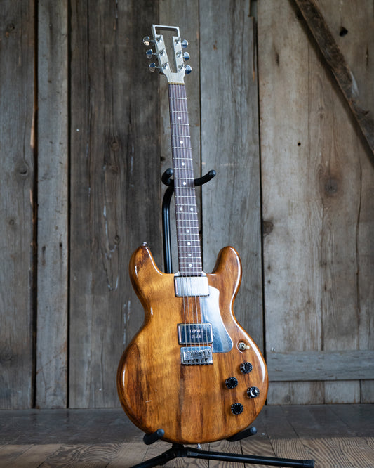 Showroom photo of Travis Bean TB-1000 Standard Electric Guitar (1976)