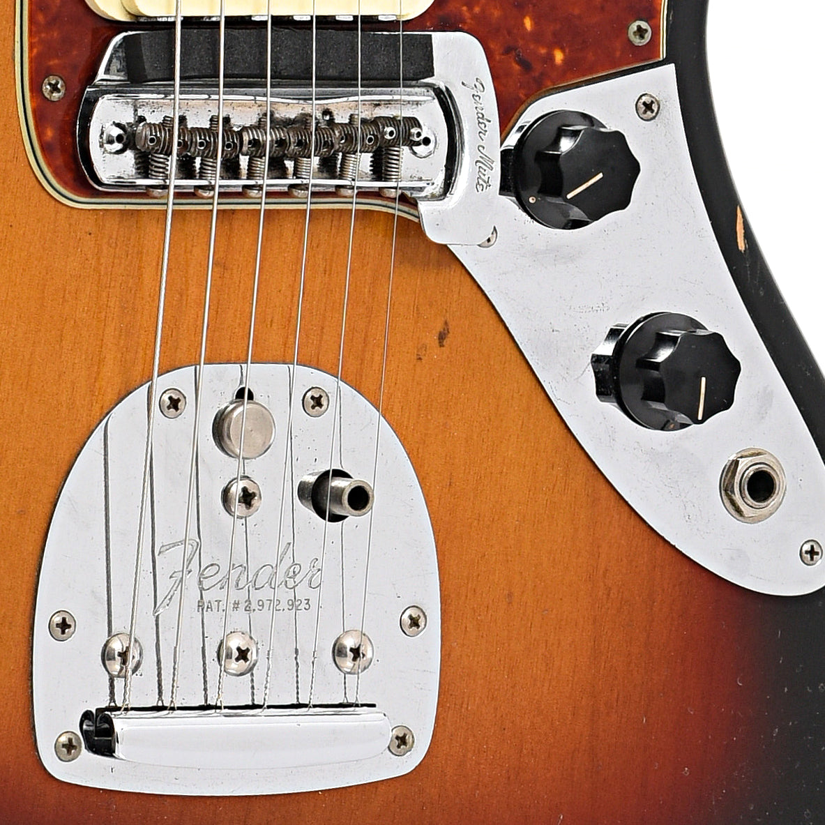 Tailpiece, bridge and controls of Fender Jaguar