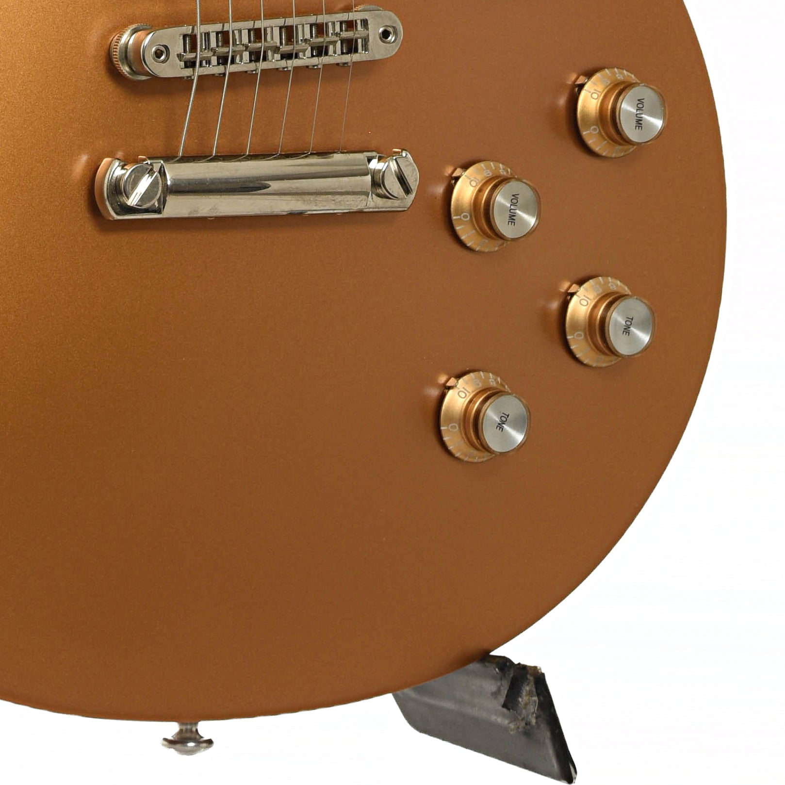 Bridge and controls ofGibson Les Paul Tribute T Electric Guitar