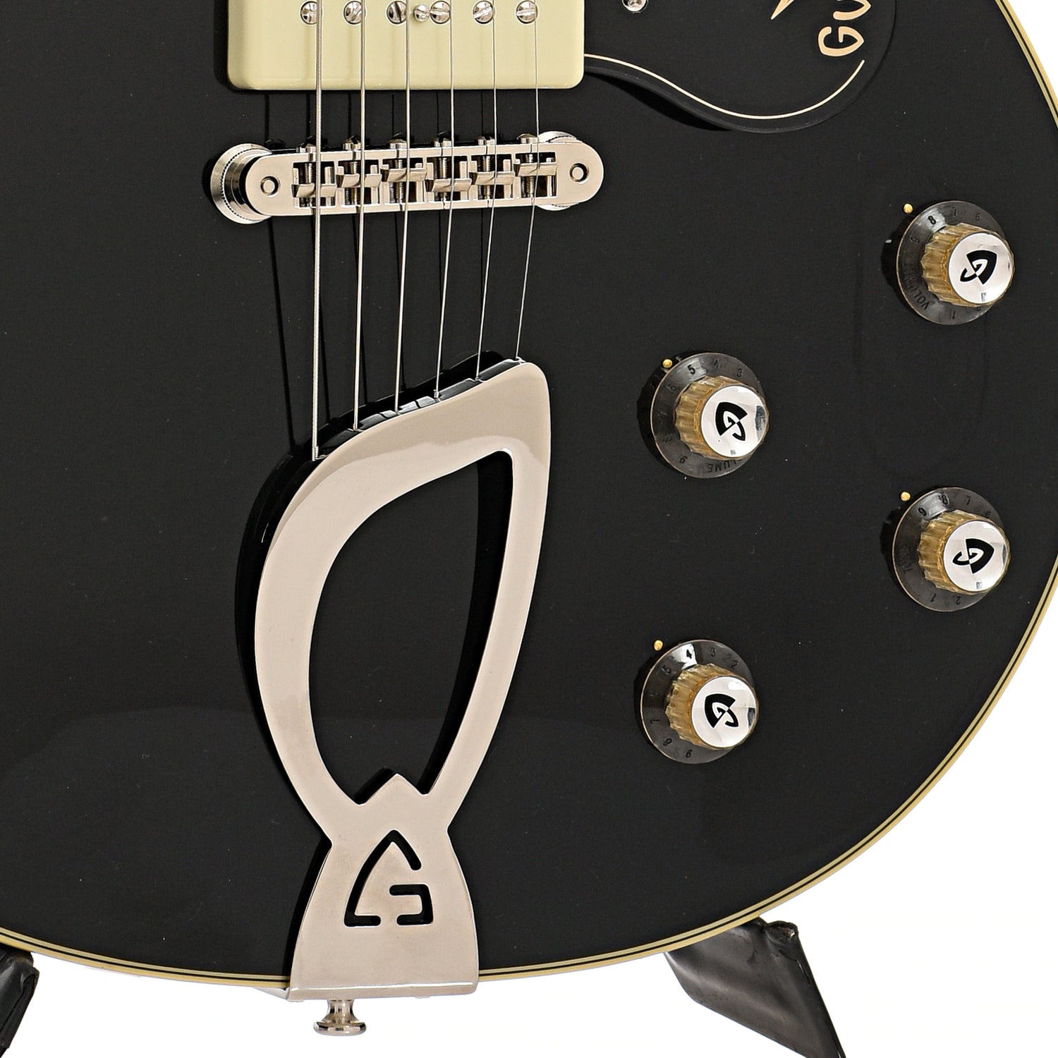 Tailpiece, bridge, and controls of Guild Newark St. Collection M-75 Aristocrat Hollow Body Archtop Guitar, Limited Edition Black Finish