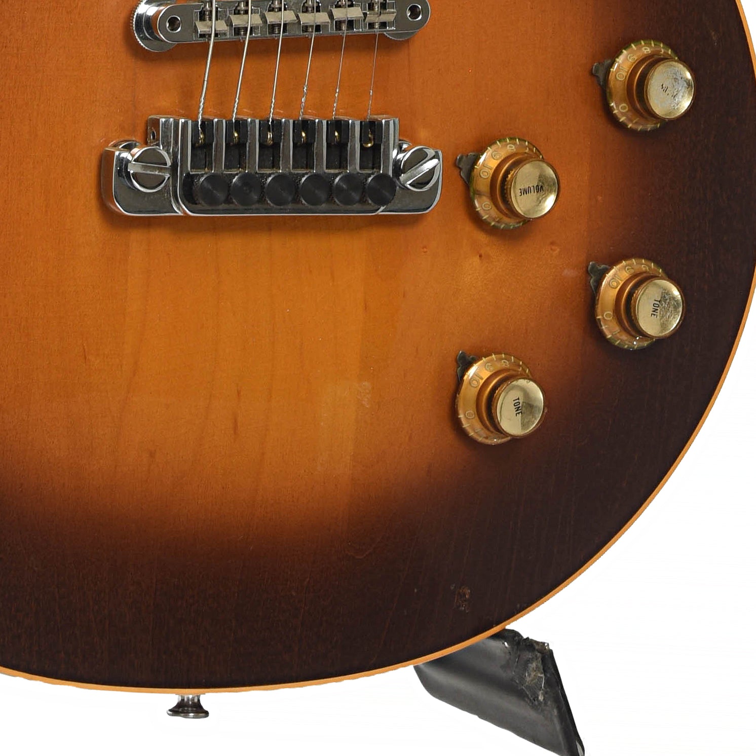 Bridge and controls of Gibson Les Paul Deluxe Electric Guitar
