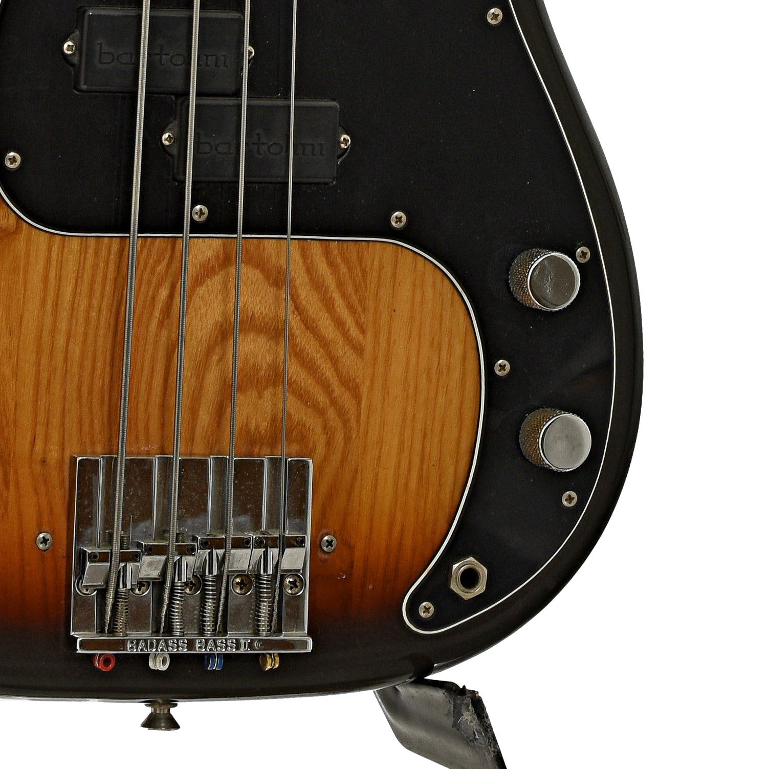 Bridge and controls of Fender Precision Fretless Electric Bass