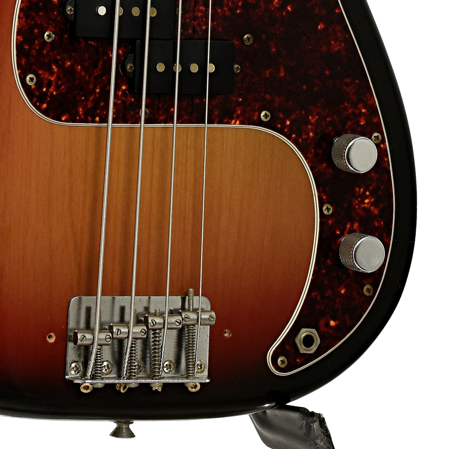Bridge and controls of Fender Precision Electric Bass