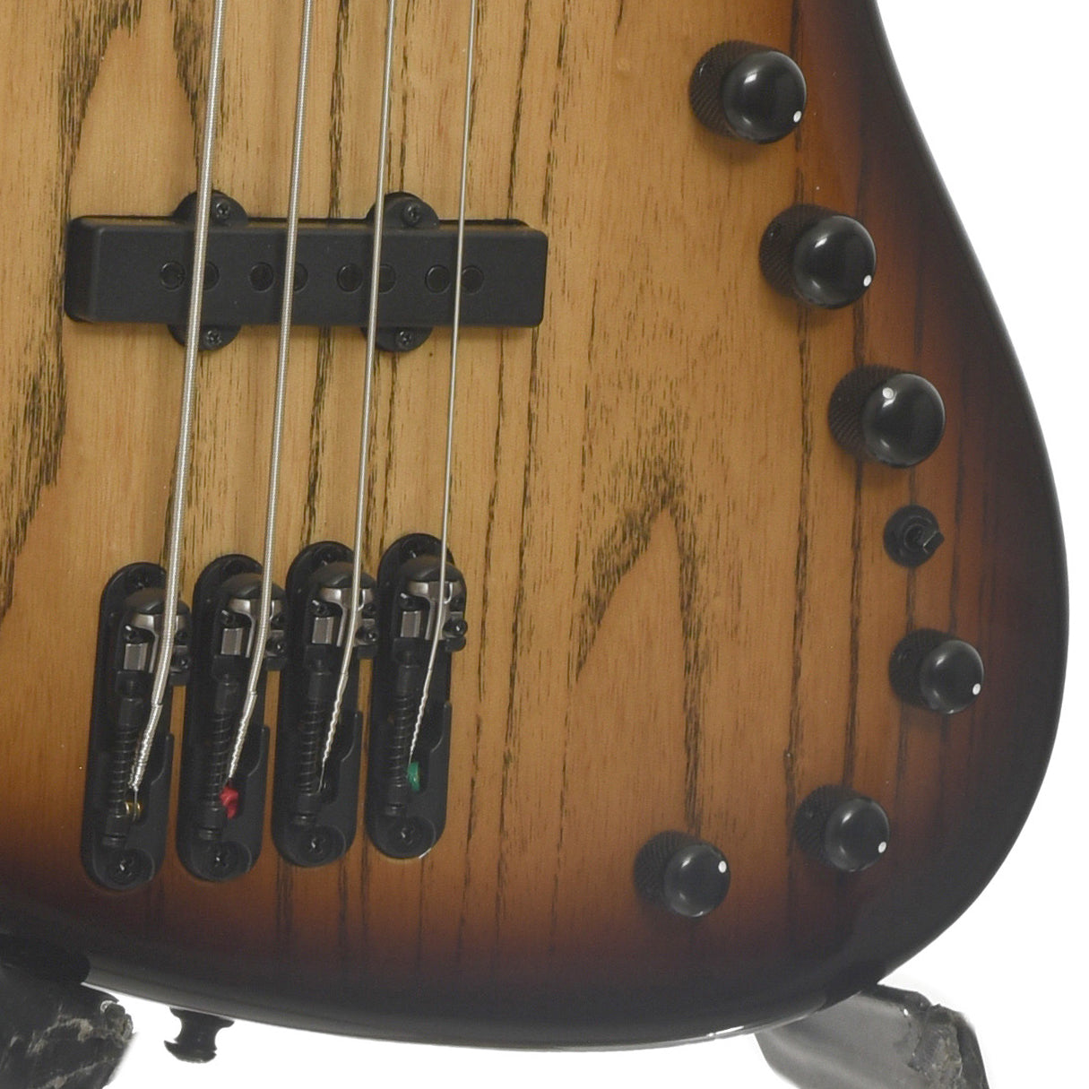 Bridge and controls of Ibanez Mode MDM1300 Electric Bass, Natural Stained Amber Burst