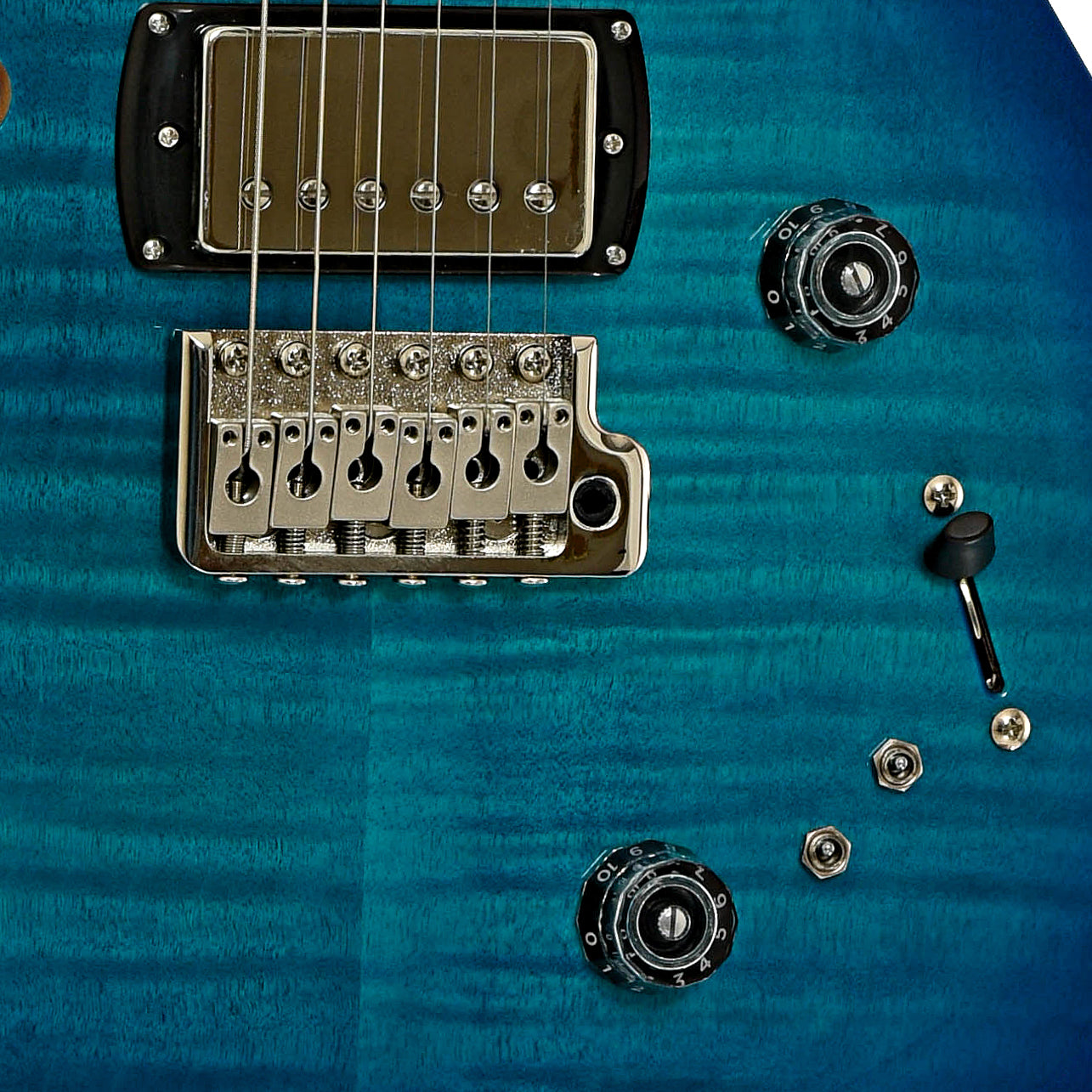 Bridge and controls of PRS SE Special Semi-Hollow Electric Guitar Lake Blue