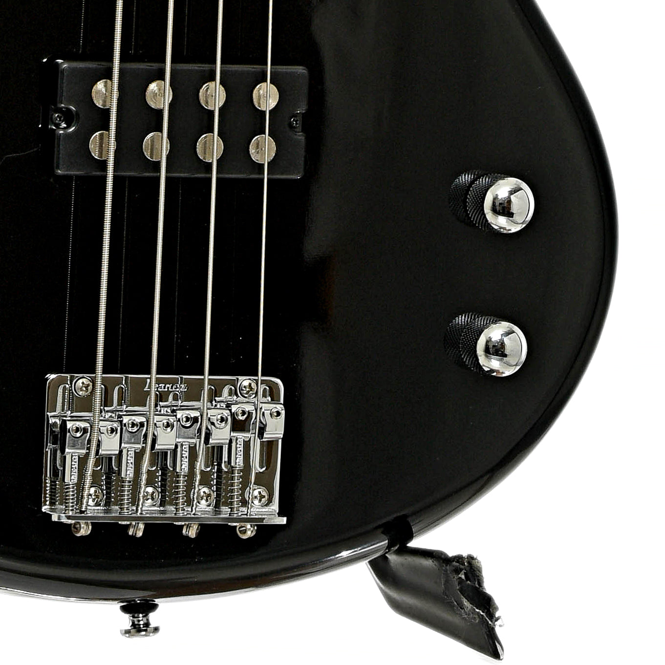 Bridge and controls of Ibanez Gio GSR100EX Electric Bass Guitar, Black