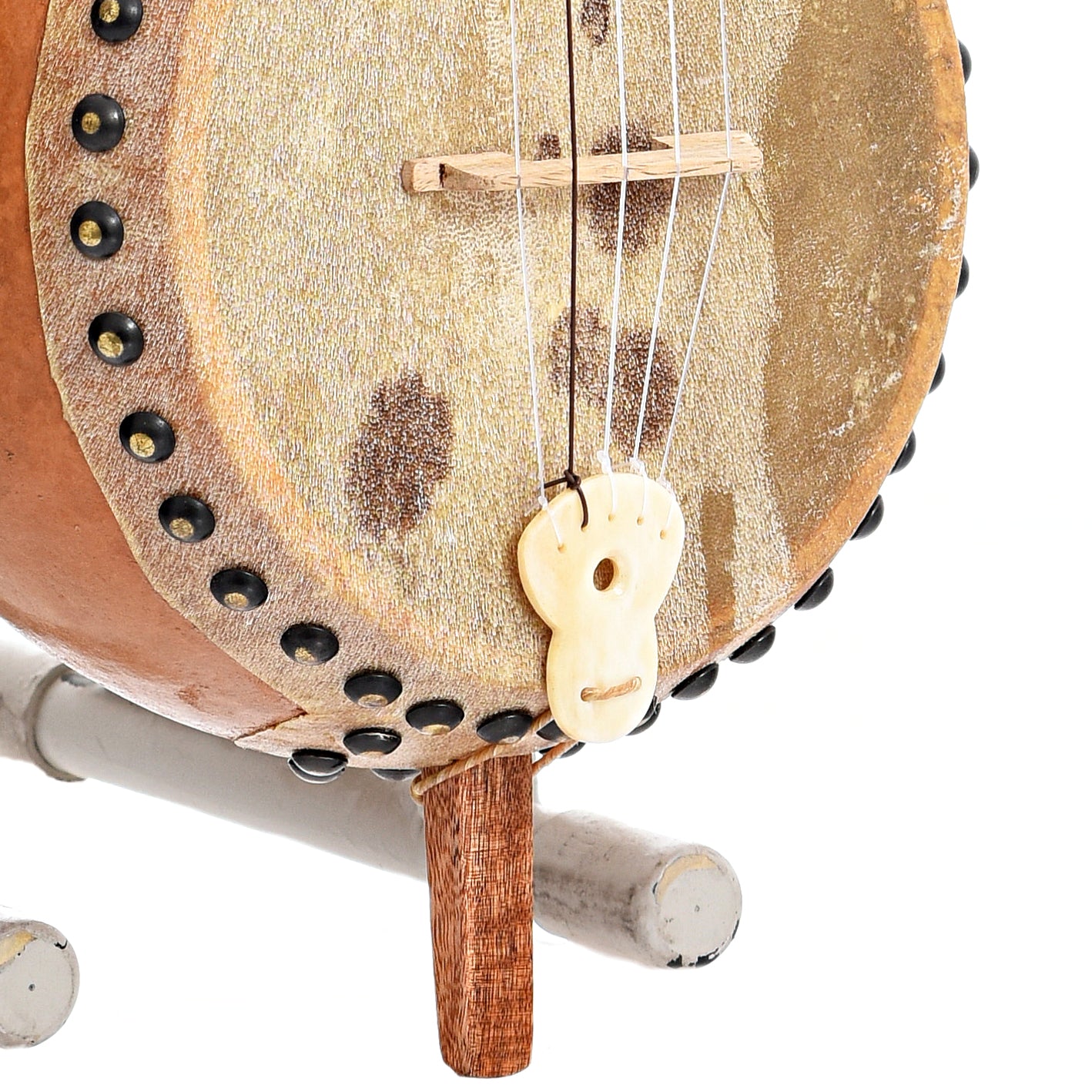 Tailpiece and bridge of Menzies Fretless Gourd Banjo #578