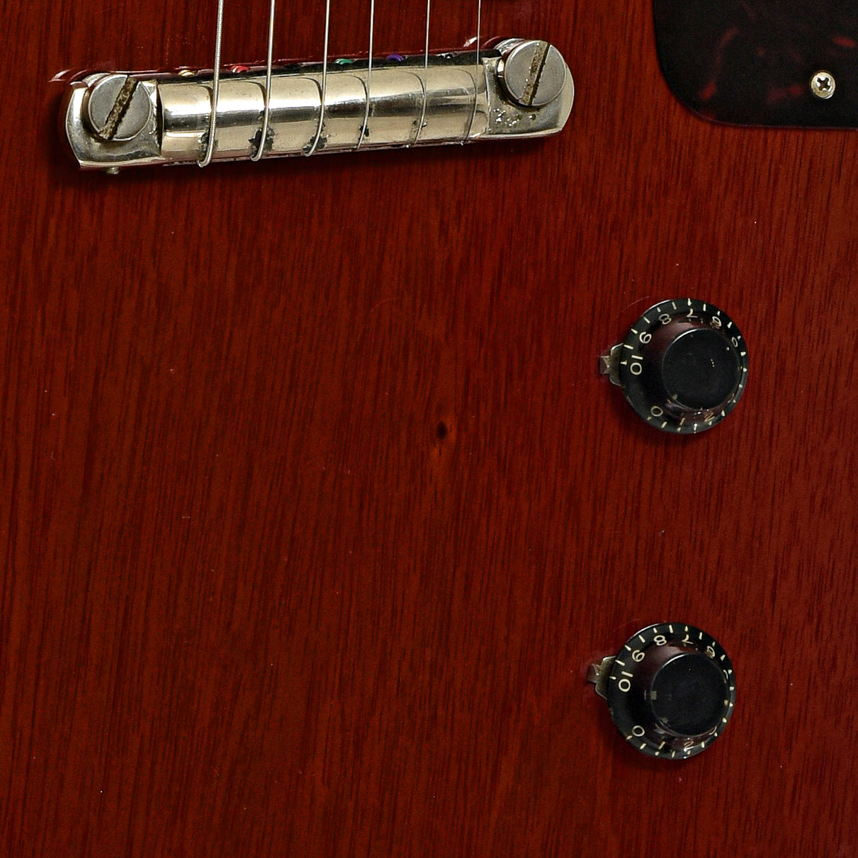 Bridge and controls of Gibson Les Paul Jr. Electric Guitar