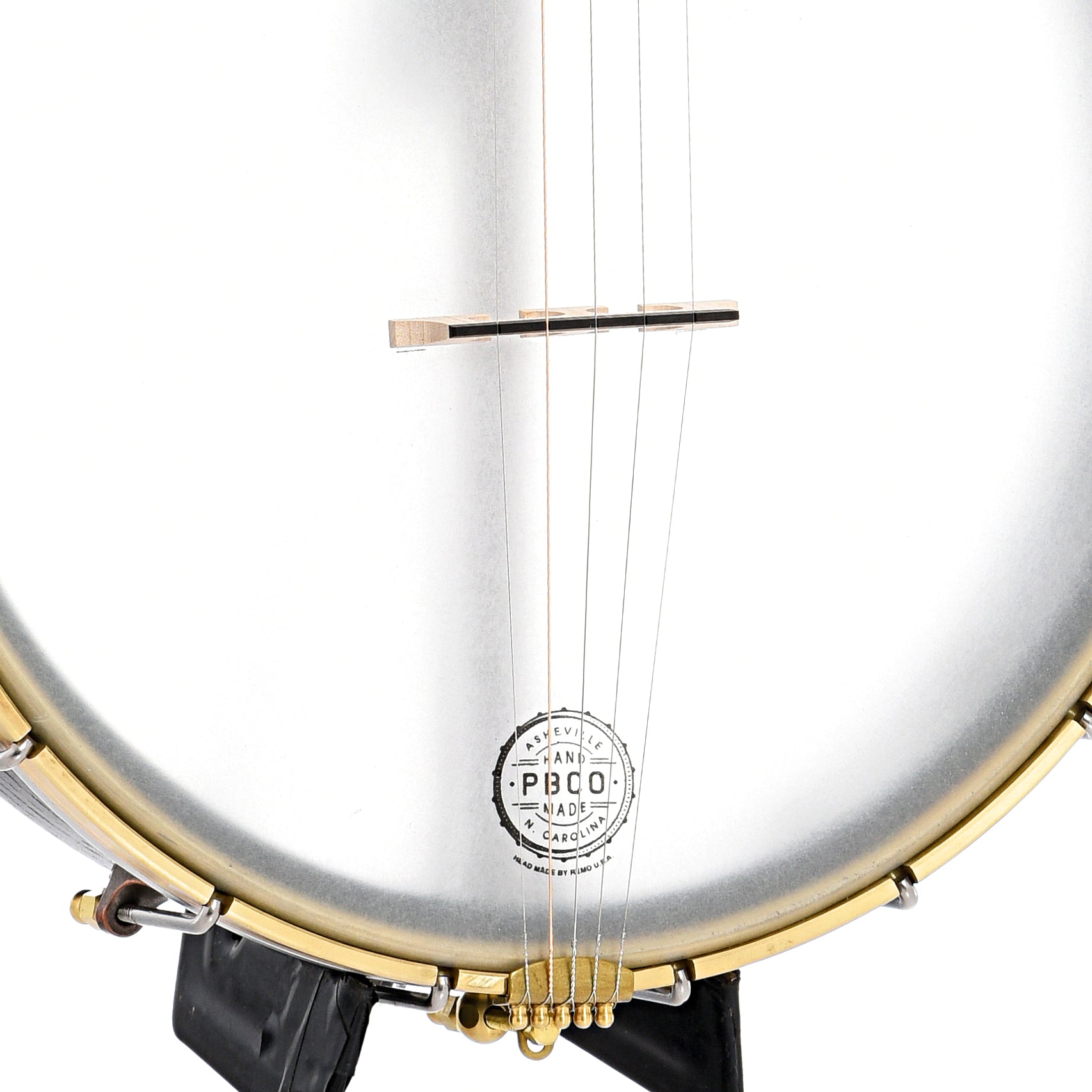 Tailpiece and bridge of Pisgah Banjo Co. 12" Woodchuck Openback Banjo