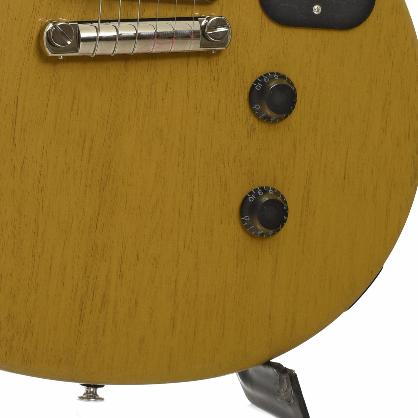 Bridge and controls of Gibson Les Paul Junior Double Cut Electric Guitar