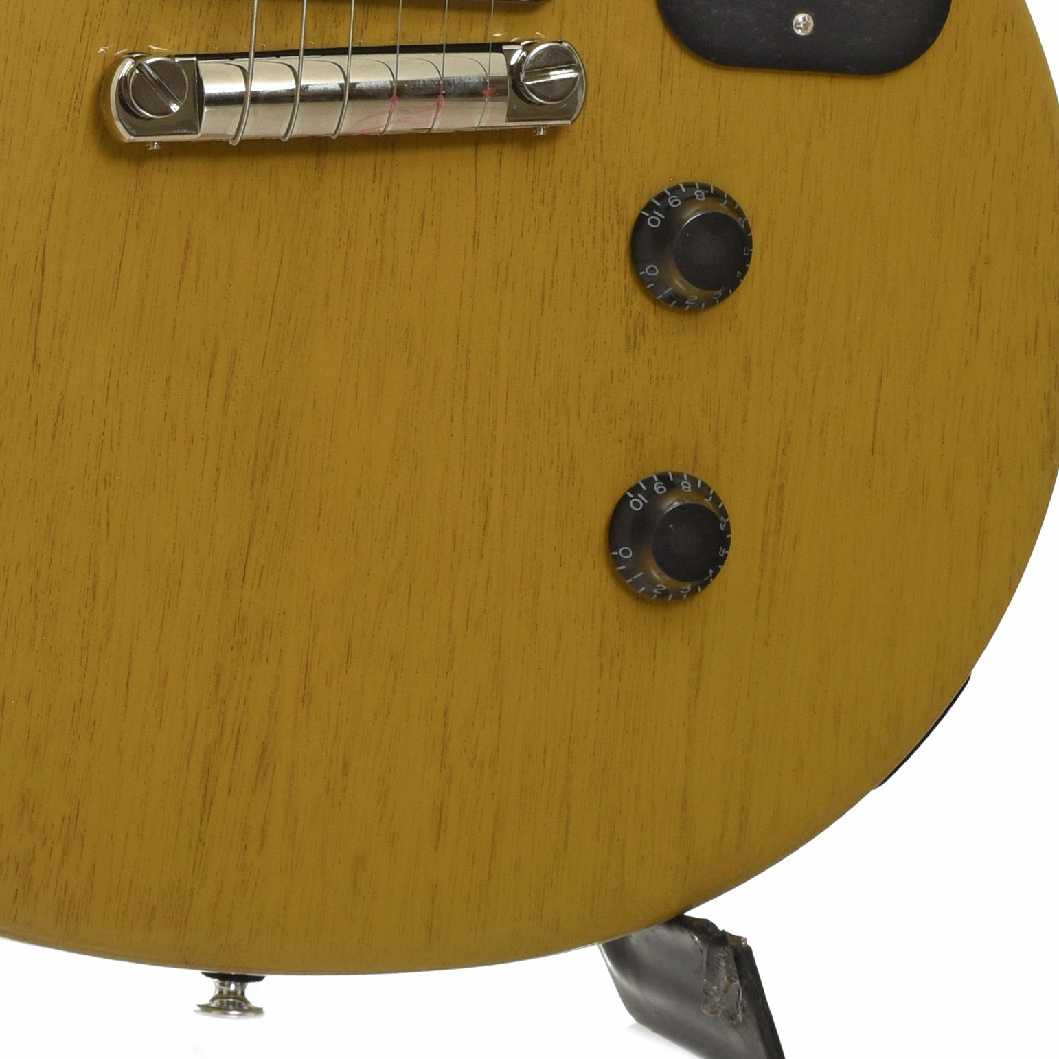 Bridge and controls of Gibson Les Paul Junior Double Cut Electric Guitar
