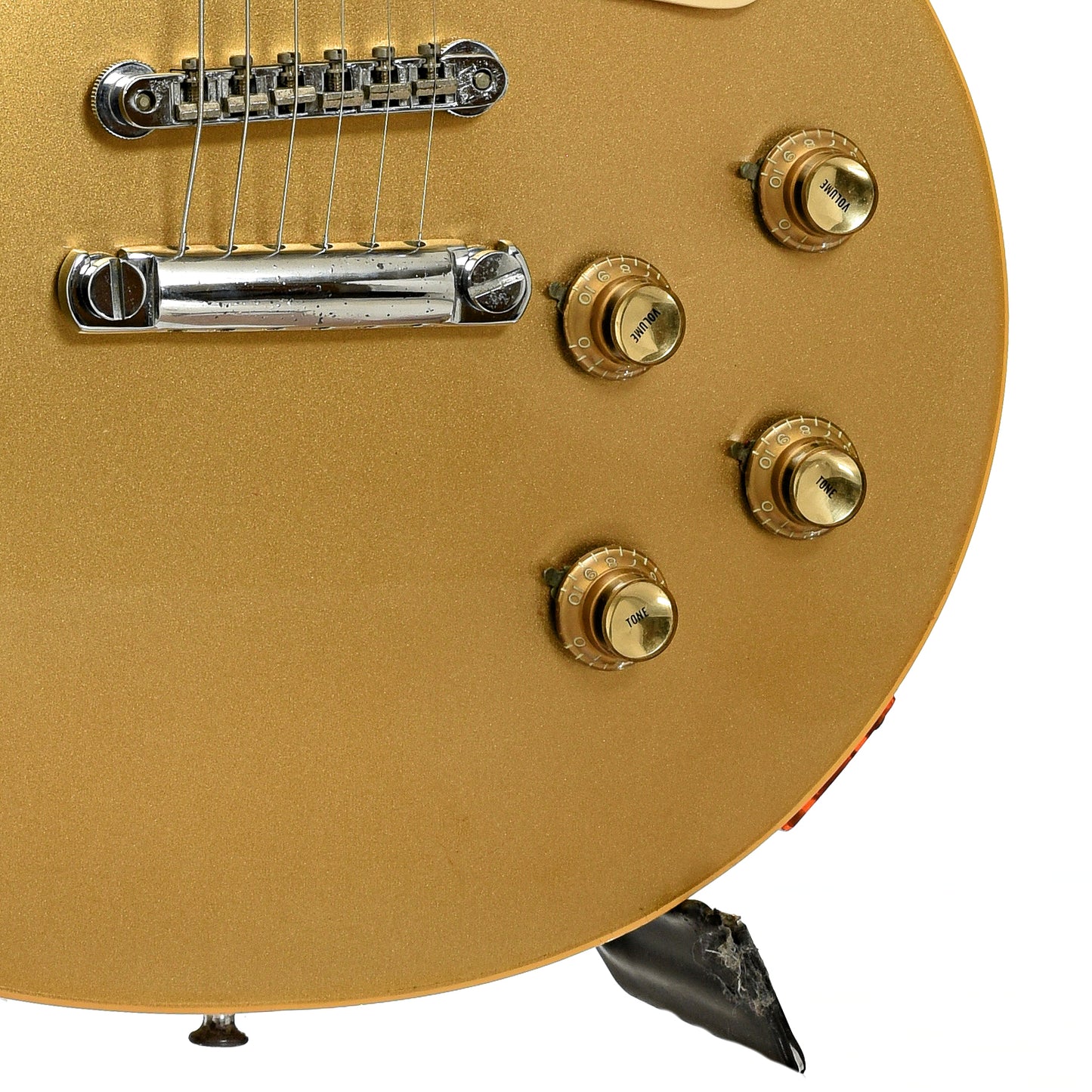 Bridge and controls of Gibson Les Paul Deluxe Electric Guitar