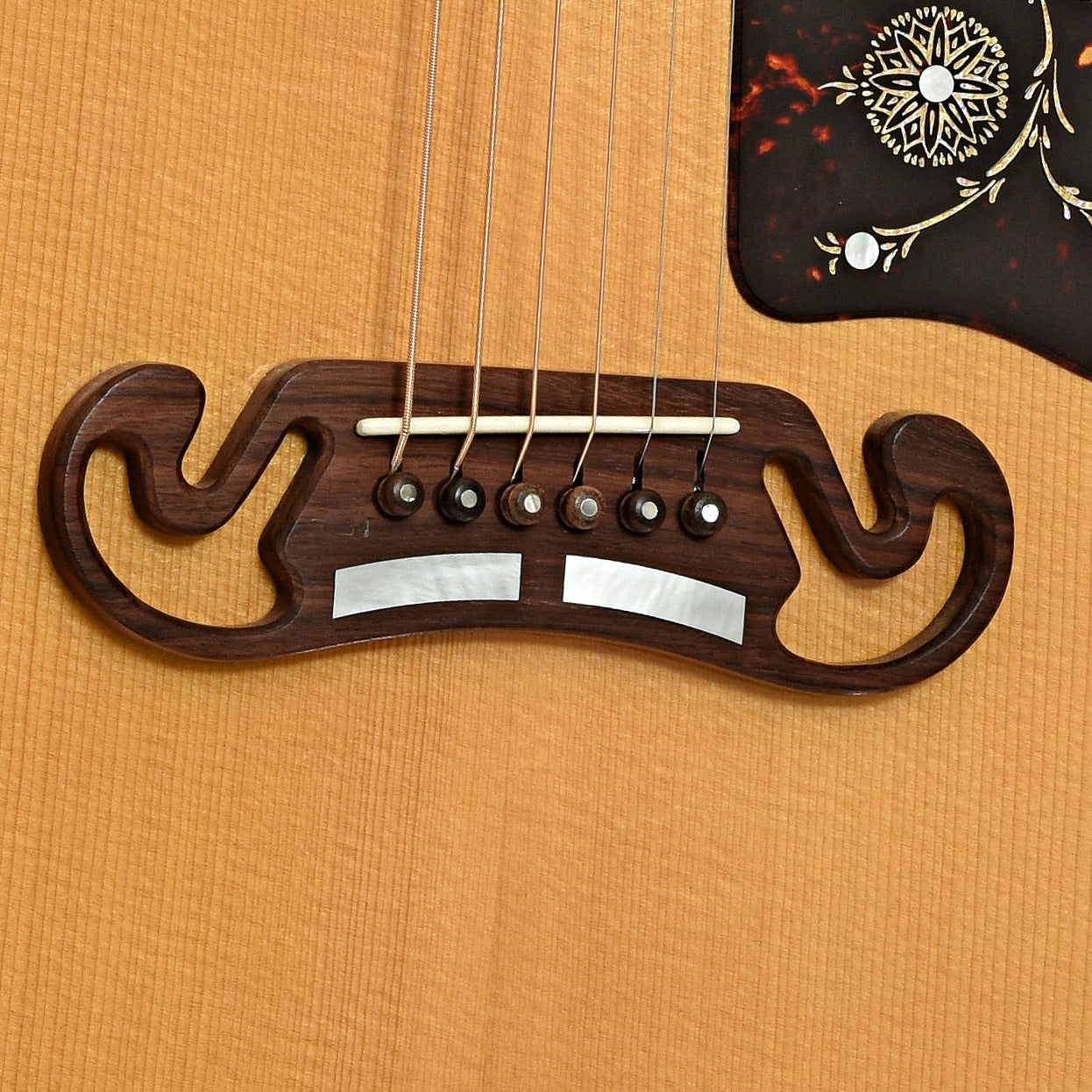 Bridge of Gibson J-200 Commemorative Limited Edition Acoustic Guitar