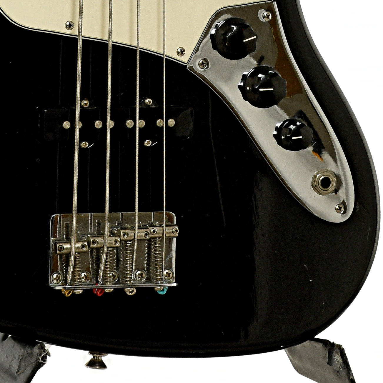 Bridge and controls of Fender Standard Jazz Electric Bass