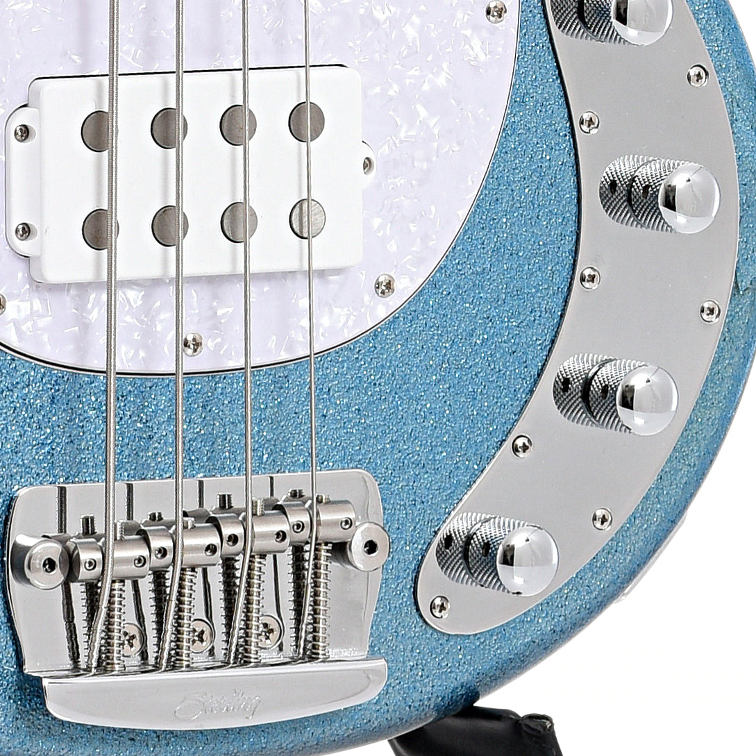 Bridge and controls of Sterling by Music Man B-Stock Stingray34 4-String Bass, Blue Sparkle