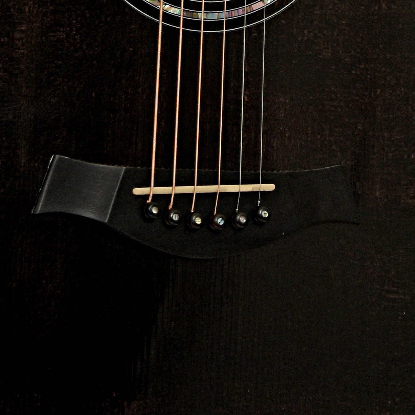 Bridge of Taylor 612 Translucent Black Acoustic Guitar