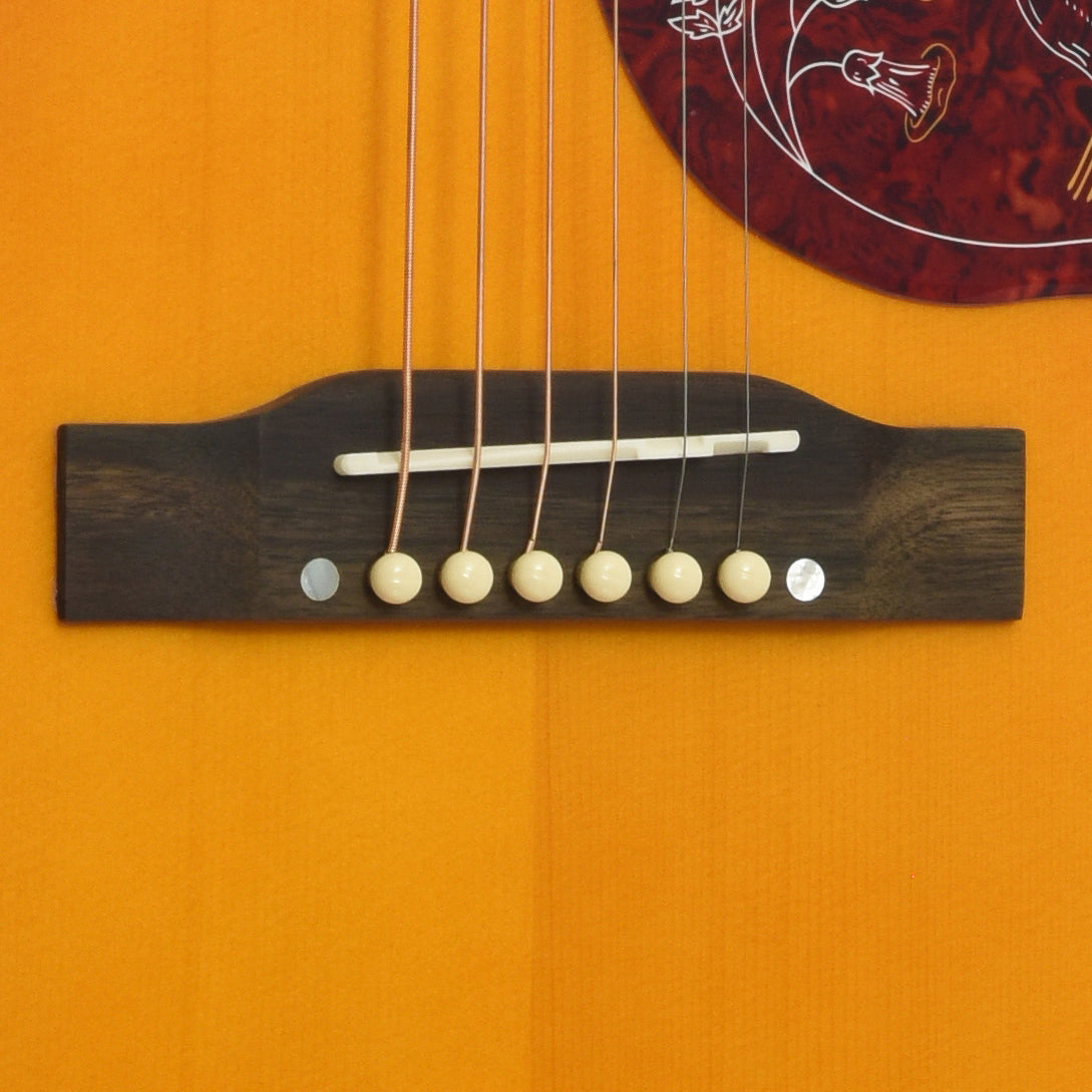 Bridge of Epiphone Hummingbird Standard Acoustic Guitar