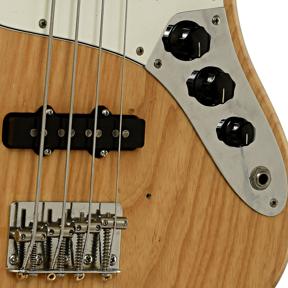 Bridge and controls of Fender Jazz Electric Bass 