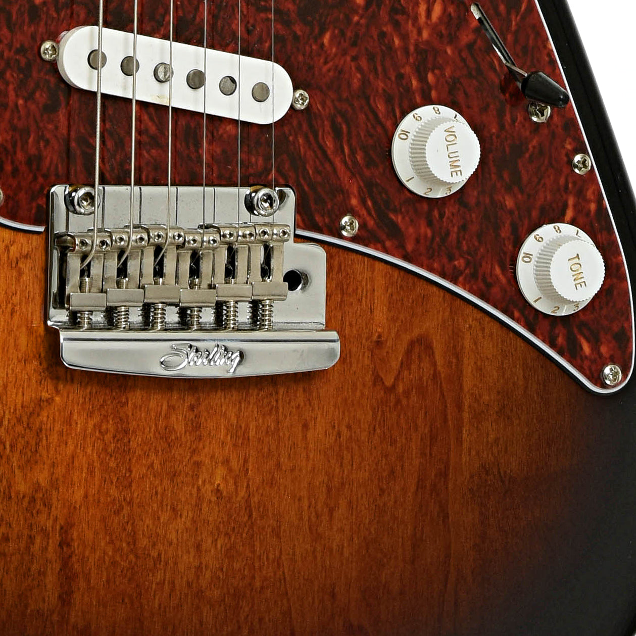 Bridge and controls of Sterling by Music Man Cutlass CT50 SSS Electric Guitar 