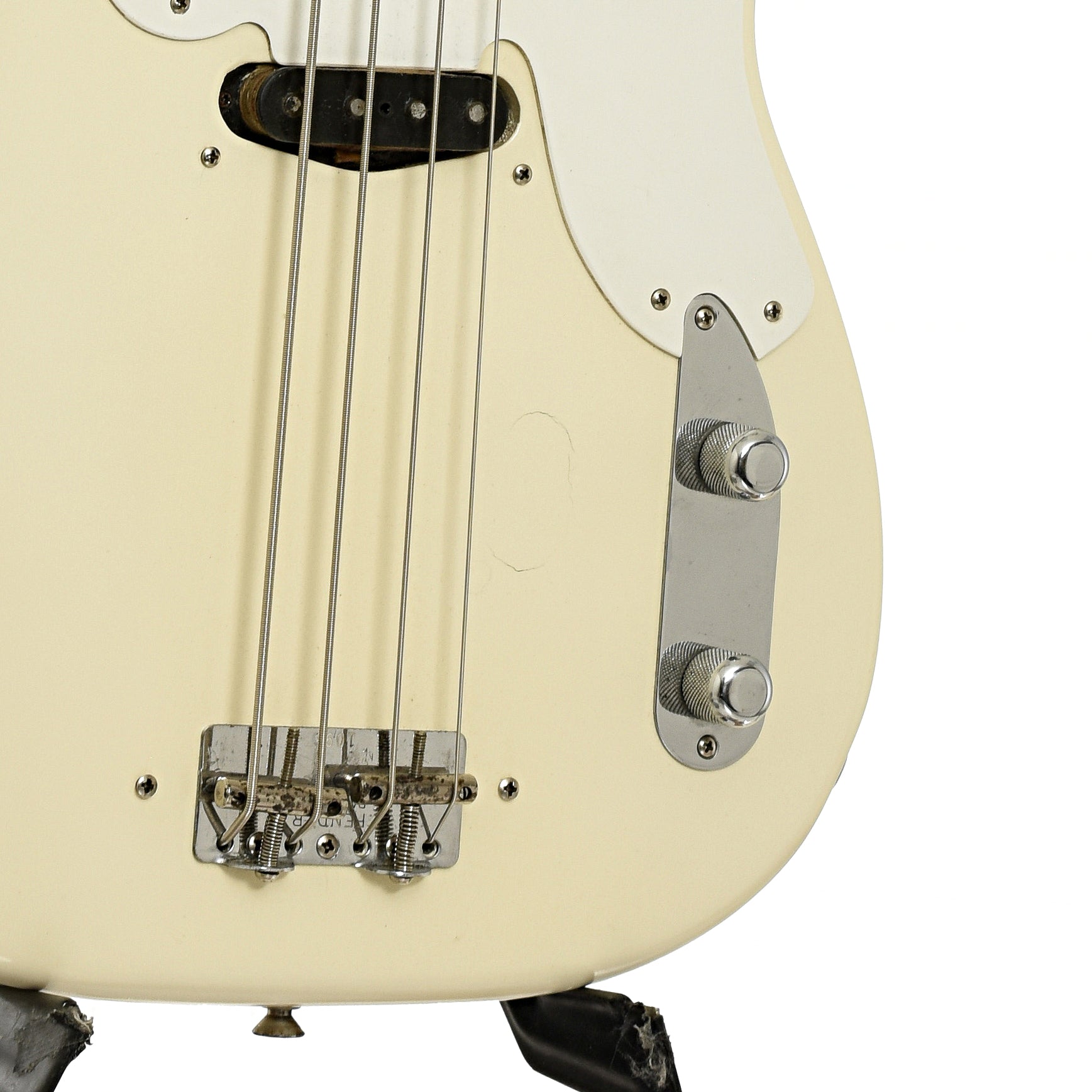 Bridge and controls of Fender Precision Bass 