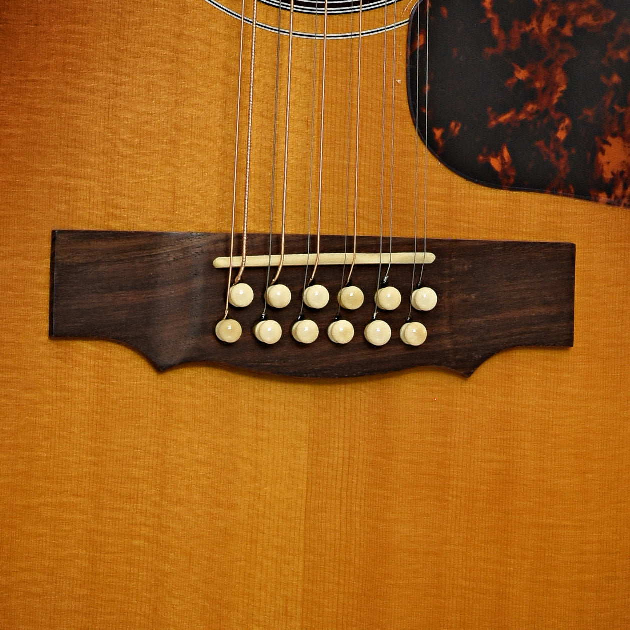 Bridge of Guild F412 12-string acoustic guitar