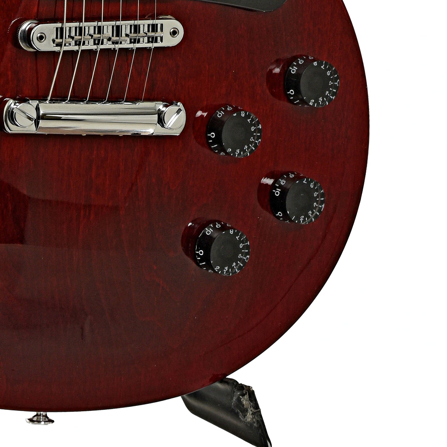 Bridge and controls of Gibson Les Paul Studio Electric Guitar