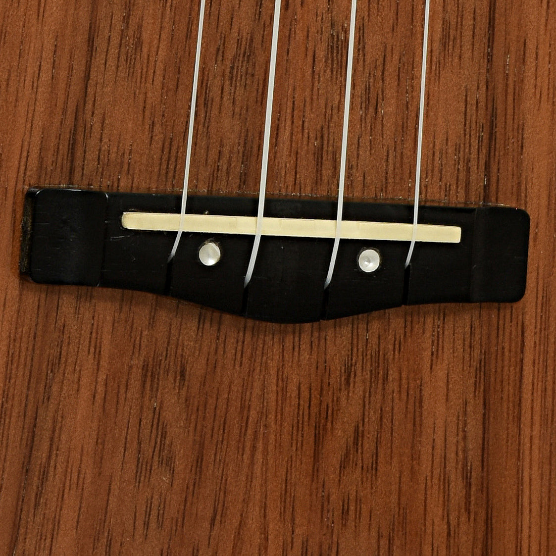 Bridge of Mitchell MU100CE/N Concert Ukulele