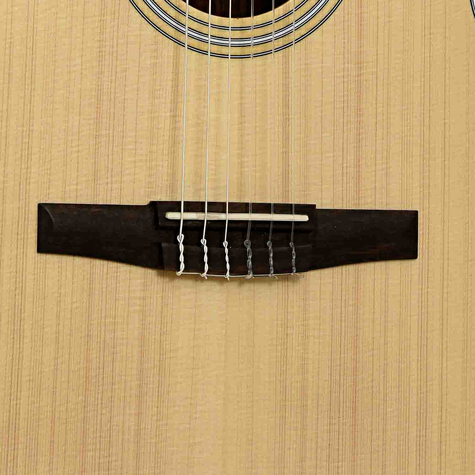 Bridge of Taylor 214CE-N Nylon String Acoustic Guitar