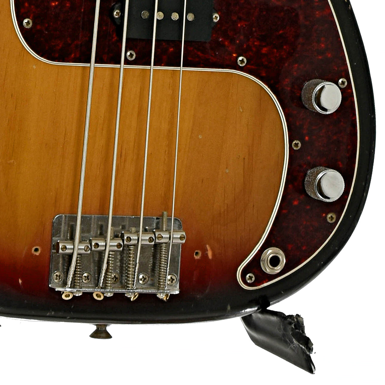 Bridge and controls of Fender Precision 4-String Electric Bass