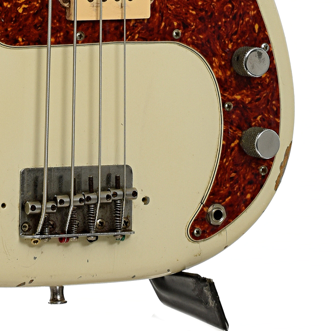 Bridge and controls of Fender Precision Electric Bass 