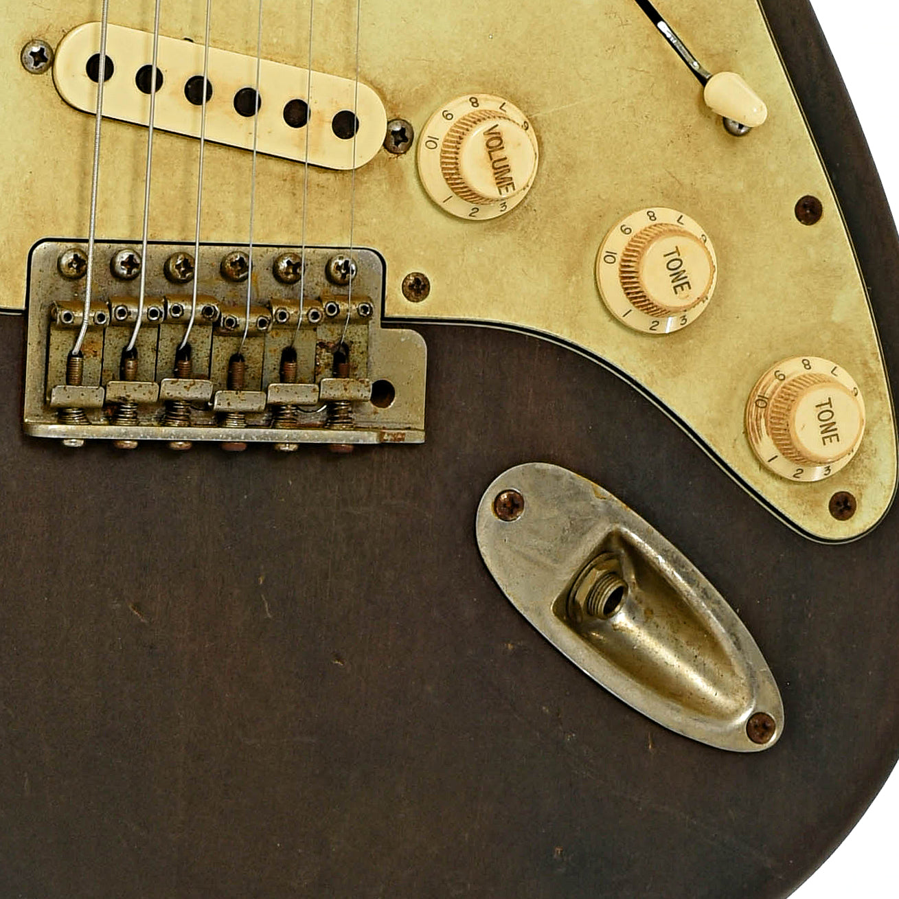 Bridge and controls of Rocketfire Total 60's Barnboard Electric Guitar