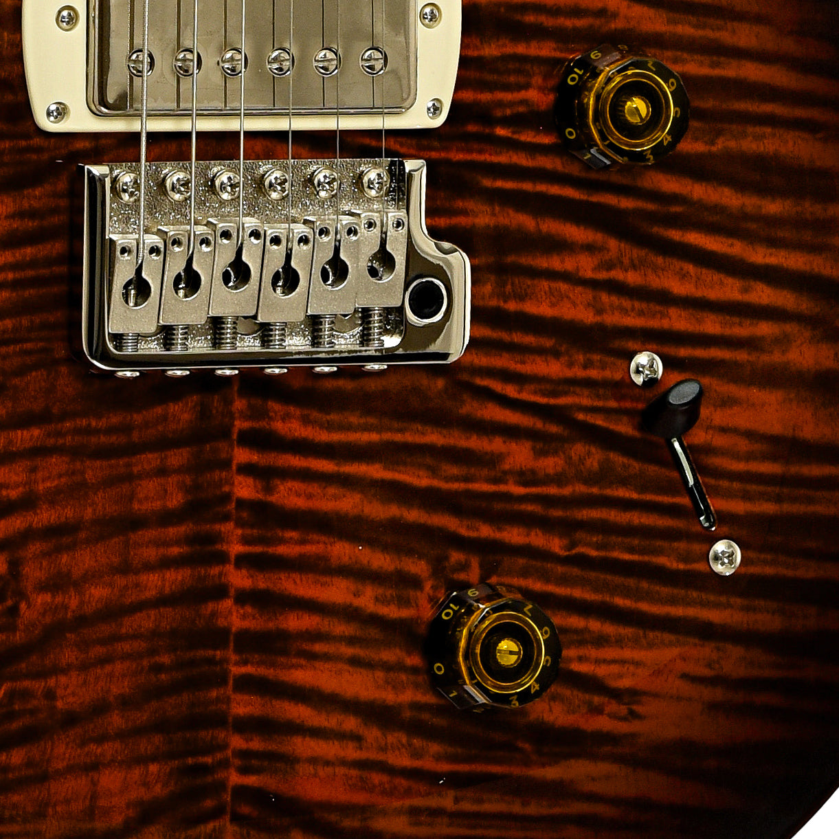 Bridge and controls of PRS SE Studio Electric Guitar Orange Tiger Smokeburst