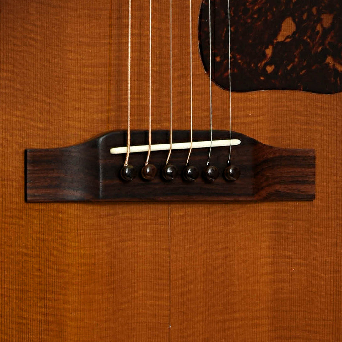 Bridge of Gibson J-100 Custom Acoustic Guitar