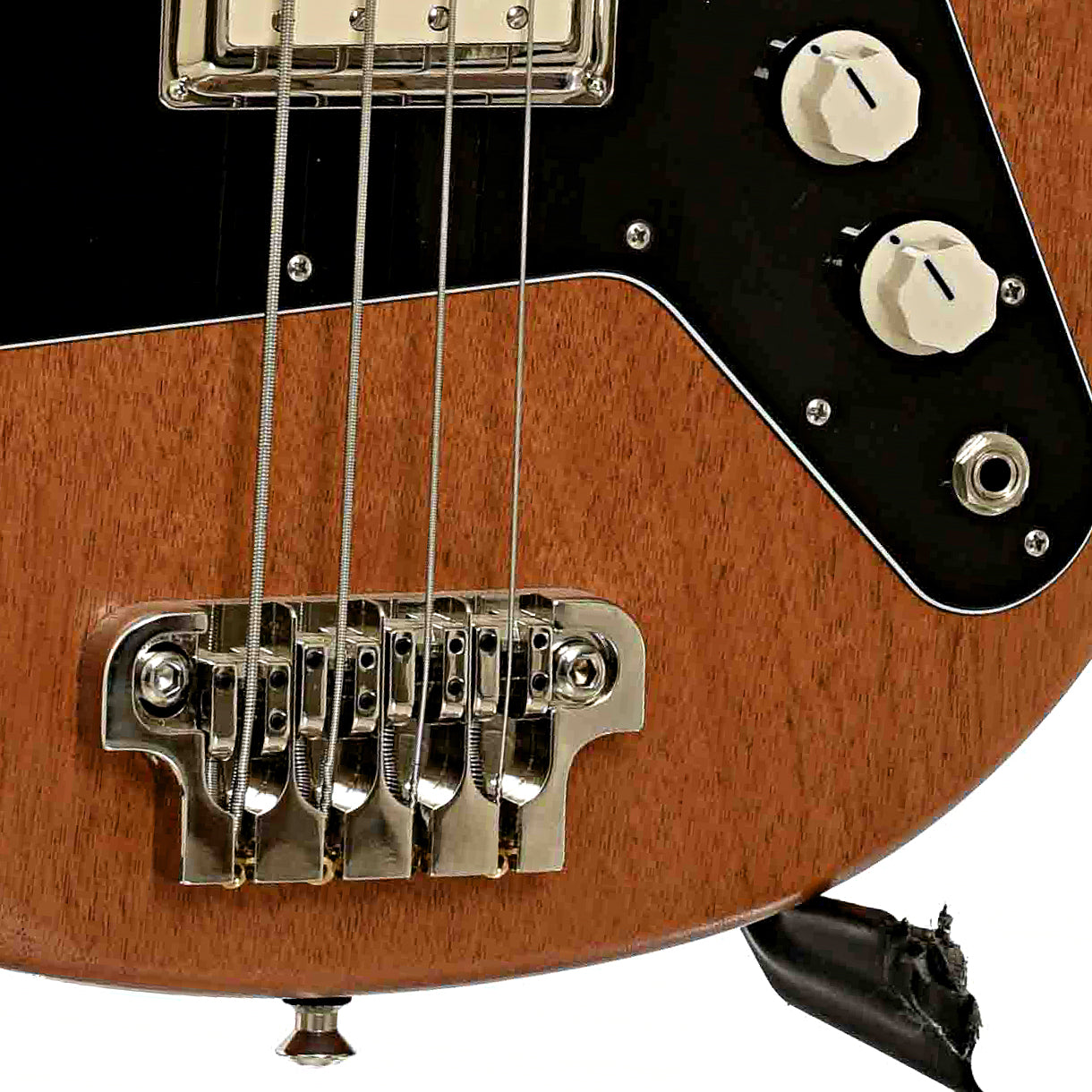 Bridge and controls of Serek Lincoln 4-String Electric Bass