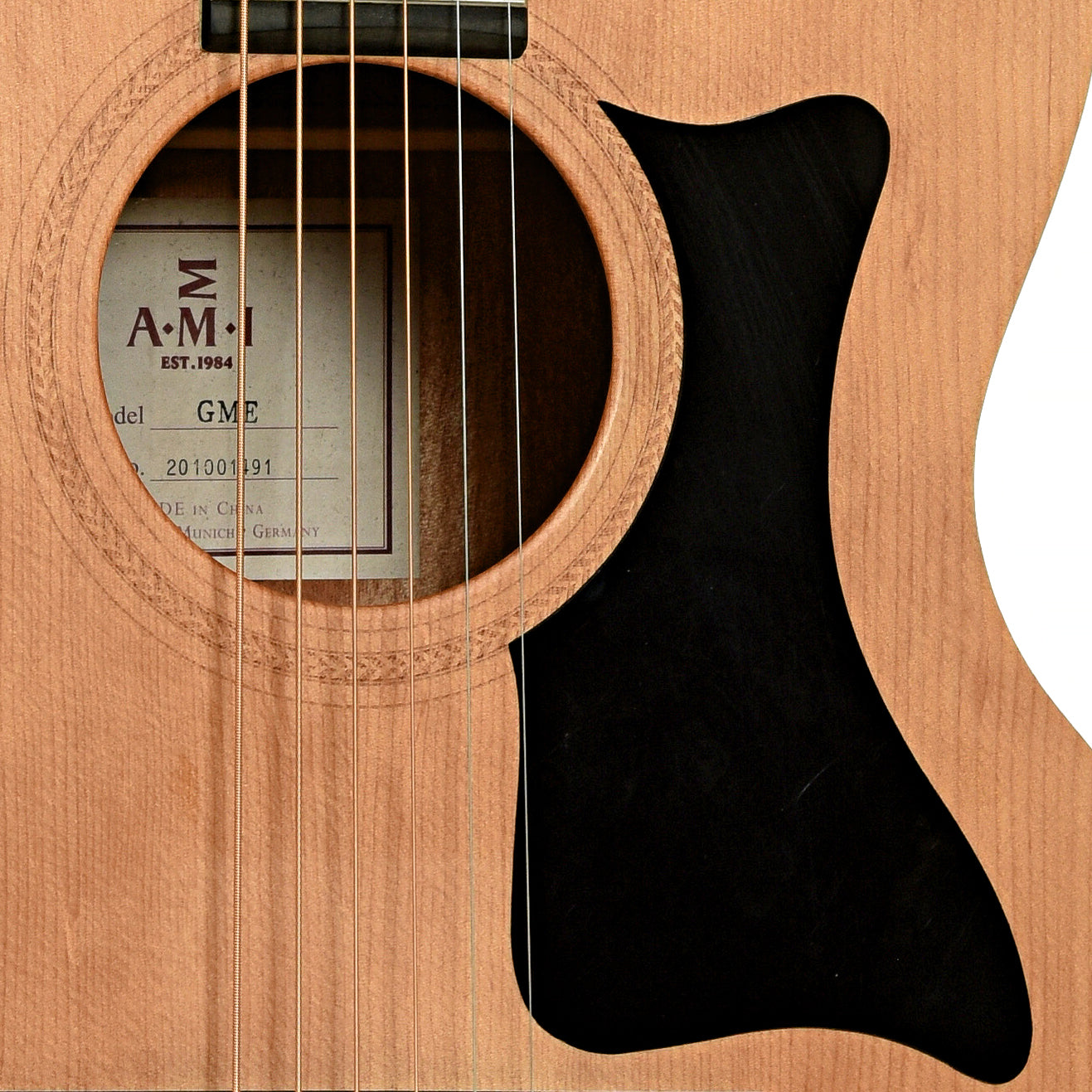 Soundhole of AMI Model GME 000-Size Acoustic Guitar
