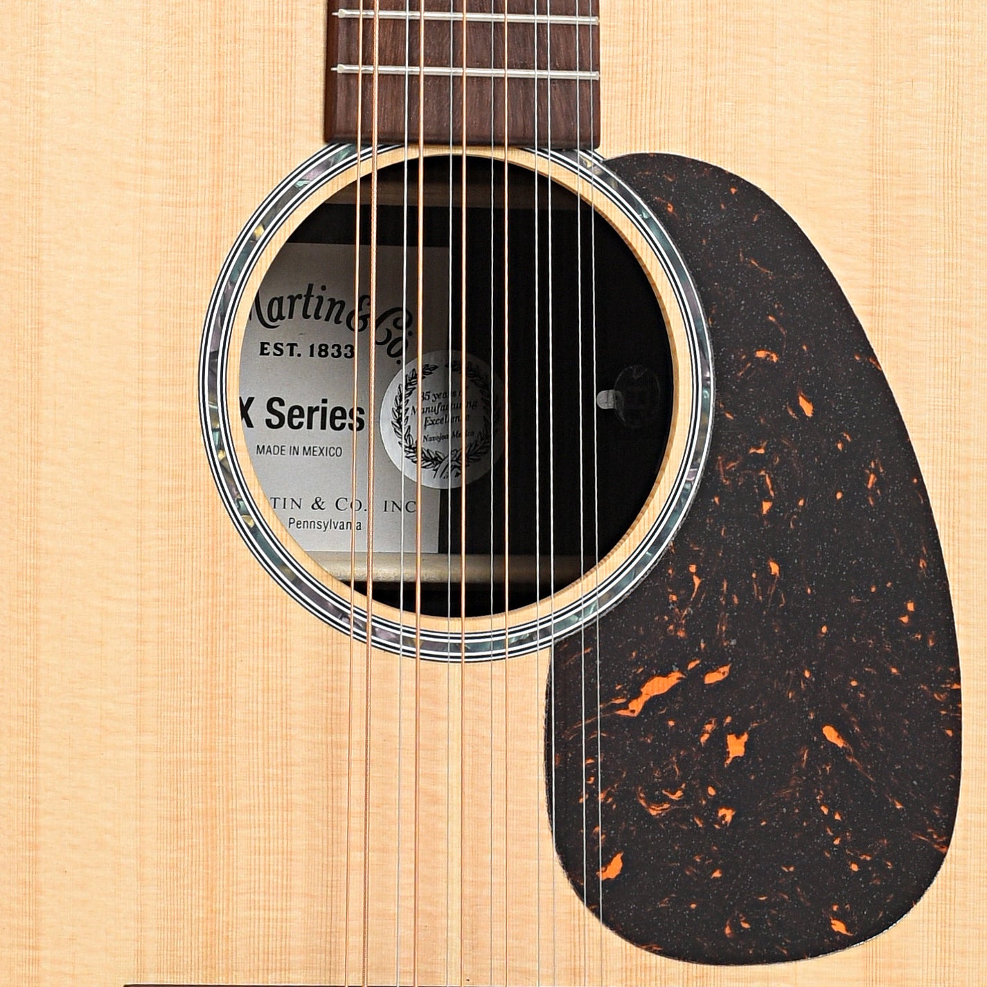 Sound hole pickguard of Martin D-X2E Brazilian Rosewood 12-String Acoustic 
