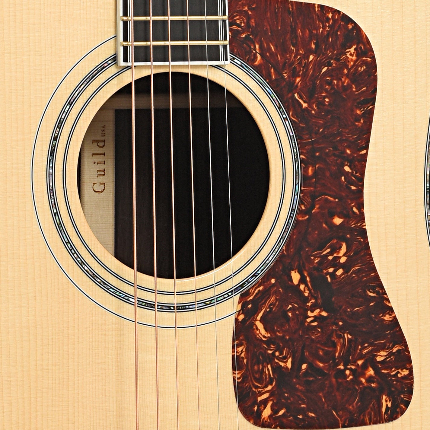Sound hole and pickguard of Guild GSR D-55 70th Anniversary Limited Edtition Dreadnought Acoustic 